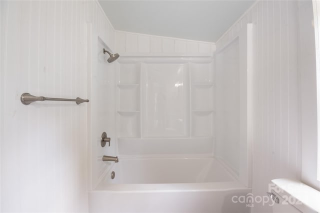 bathroom with toilet and shower / bathtub combination