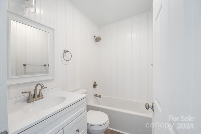 full bathroom with toilet, vanity, and shower / tub combination