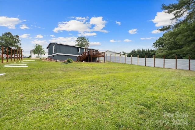 view of yard featuring a deck