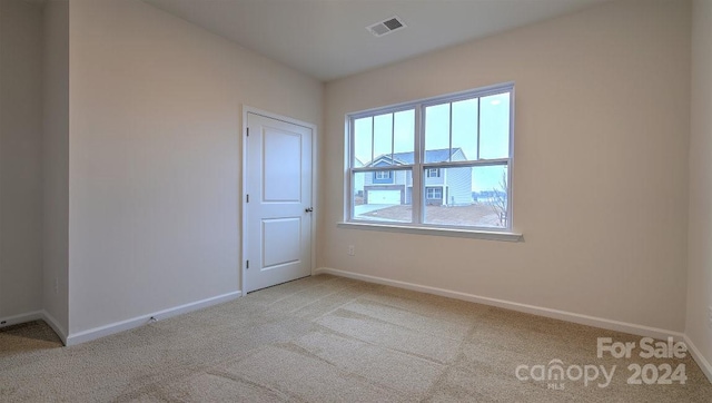 view of carpeted empty room