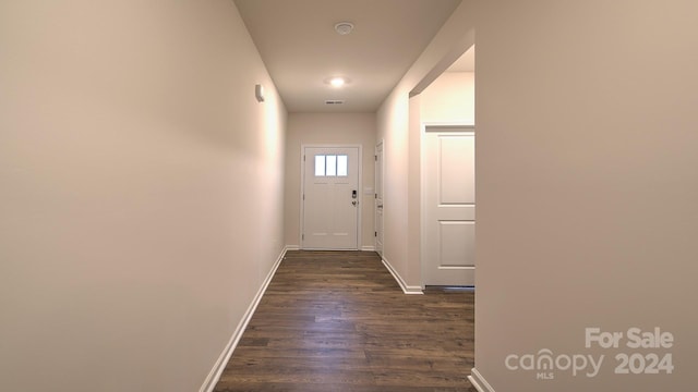 hall featuring dark hardwood / wood-style floors