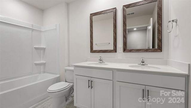 full bathroom featuring tile patterned floors, vanity, toilet, and washtub / shower combination