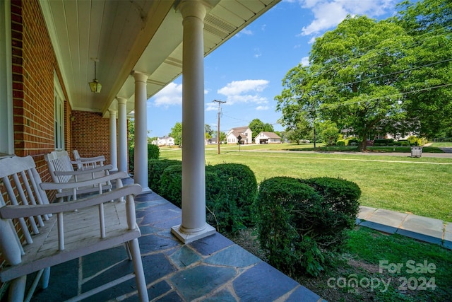 view of patio featuring a porch