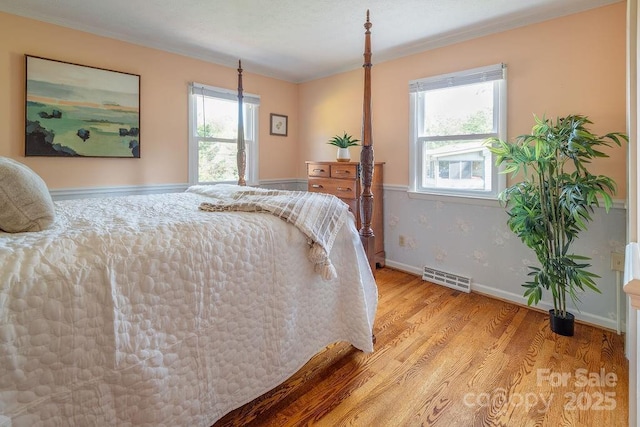 bedroom featuring light wood-type flooring