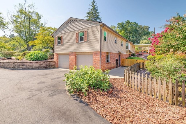 view of side of home with a garage