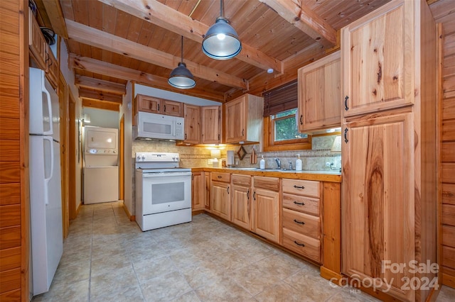 kitchen with tasteful backsplash, beam ceiling, white appliances, hanging light fixtures, and stacked washer and clothes dryer