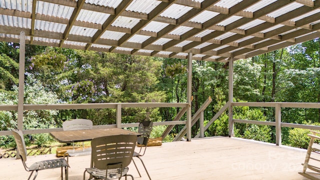 wooden deck with a pergola