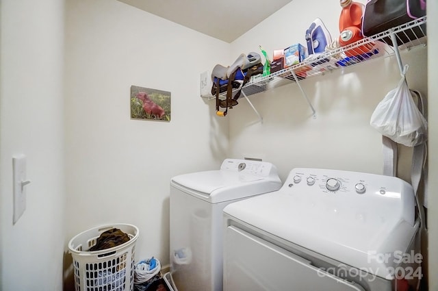 laundry room with washer and clothes dryer