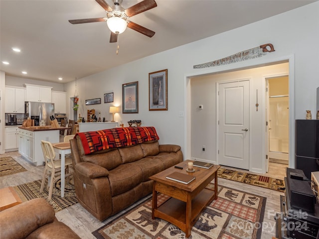 living room with ceiling fan