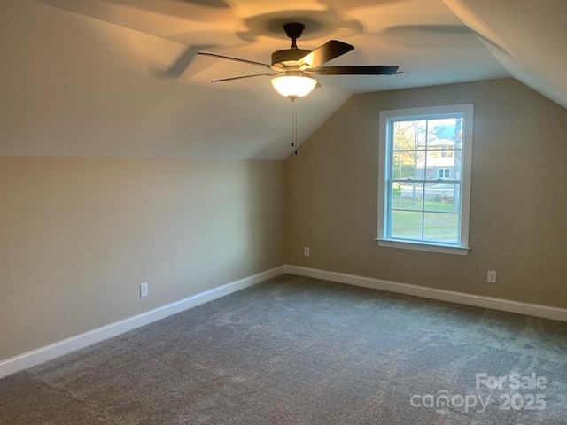 bonus room featuring carpet floors, vaulted ceiling, and ceiling fan