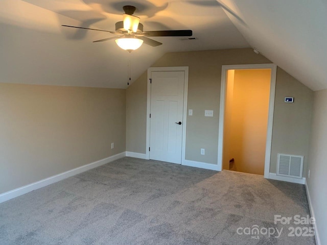 bonus room with carpet, ceiling fan, and vaulted ceiling