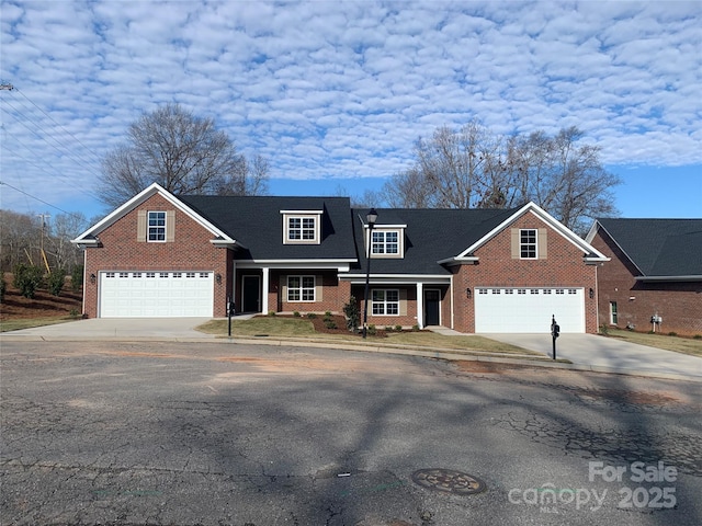 view of front of property featuring a garage