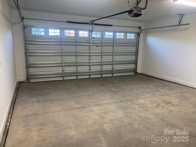 garage featuring a garage door opener