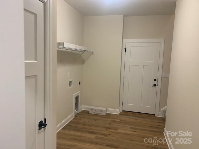 clothes washing area with dark wood-type flooring, washer hookup, and hookup for an electric dryer