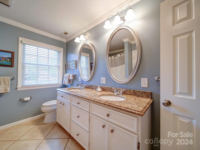 bathroom featuring toilet, tile patterned flooring, vanity, and ornamental molding