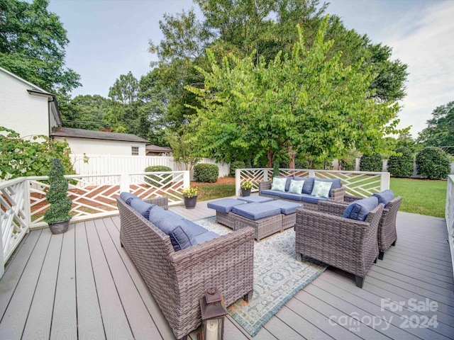 wooden terrace featuring an outdoor hangout area