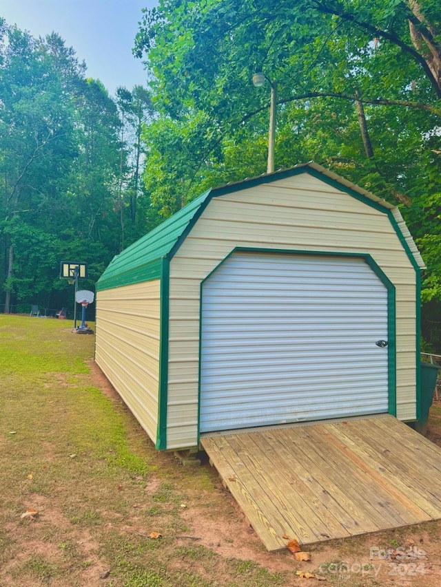 garage with a lawn