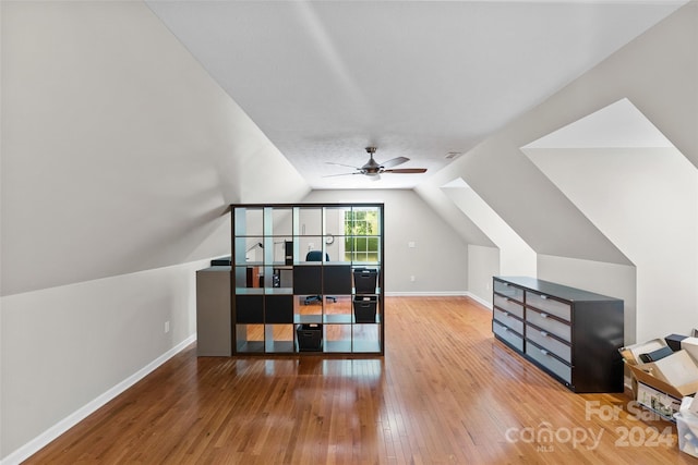 bonus room featuring wood-type flooring, vaulted ceiling, and ceiling fan