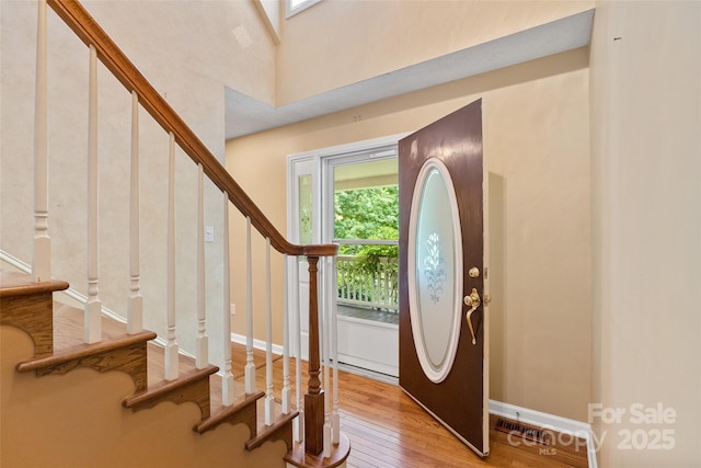 21 Farm Valley Ct, Weaverville, NC 28787 - foyer entrance with stairway, wood finished floors, and baseboards