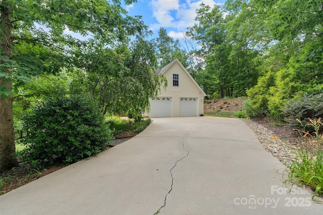 21 Farm Valley Ct, Weaverville, NC 28787 - garage featuring driveway
