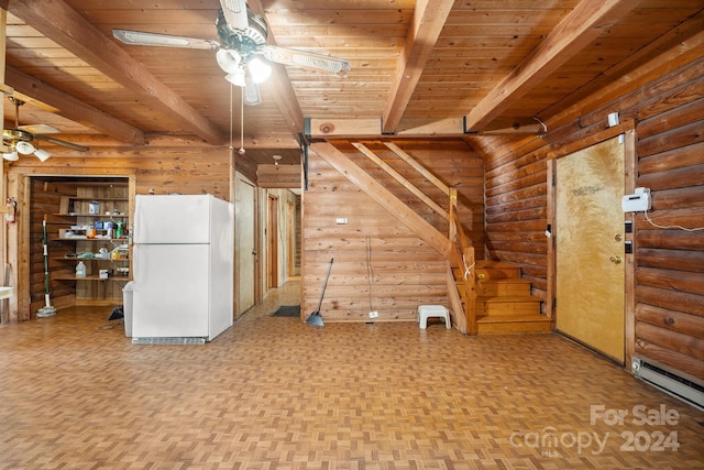 interior space with ceiling fan, beam ceiling, wooden ceiling, and rustic walls