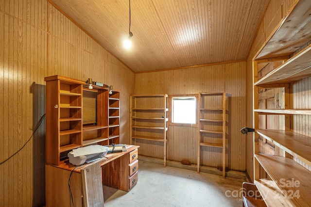 office space with vaulted ceiling, wood ceiling, and wood walls