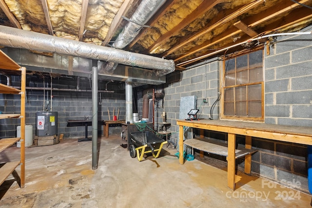 basement featuring electric water heater