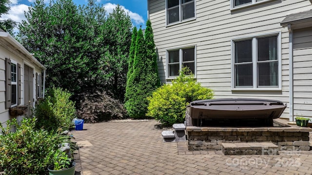 view of patio featuring a hot tub