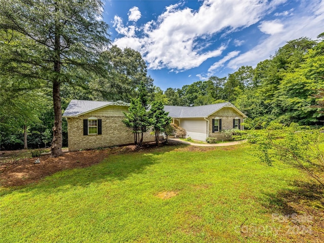 ranch-style house with a front lawn