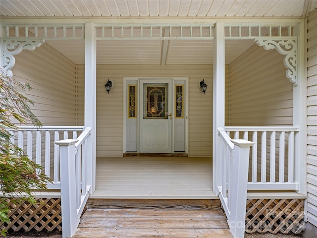 doorway to property with a porch