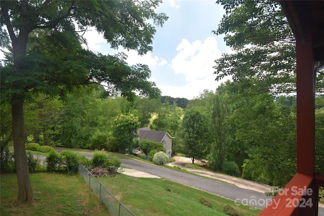 view of community featuring a lawn