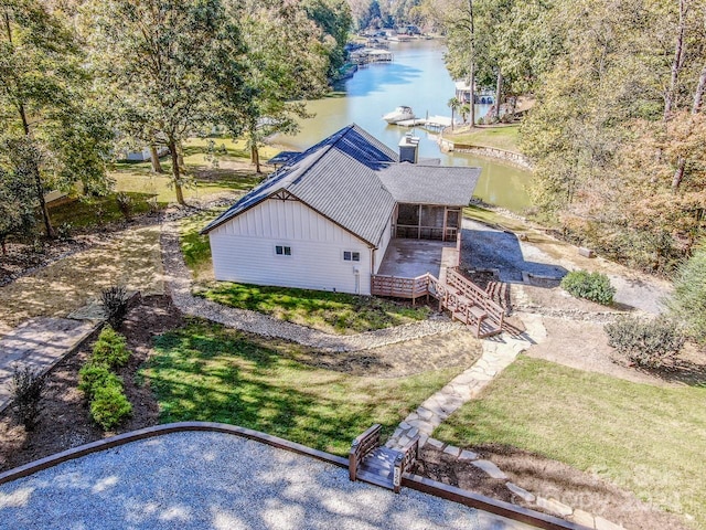 birds eye view of property featuring a water view