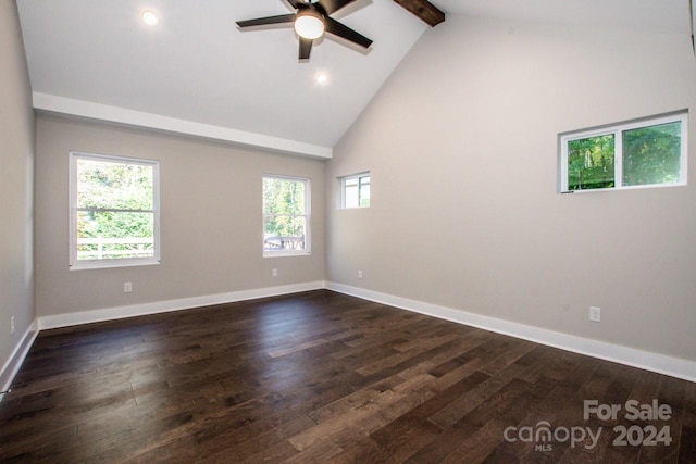 unfurnished room with beamed ceiling, dark hardwood / wood-style flooring, high vaulted ceiling, and a wealth of natural light