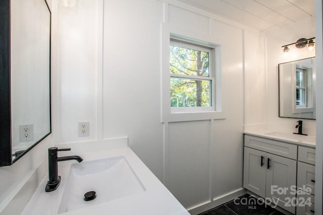 bathroom featuring tile patterned floors and vanity