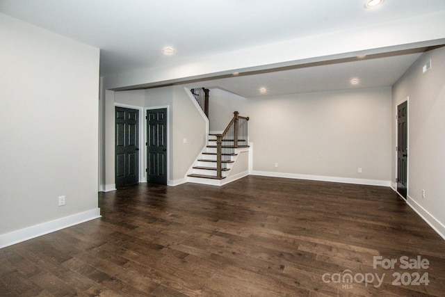 interior space with dark hardwood / wood-style floors