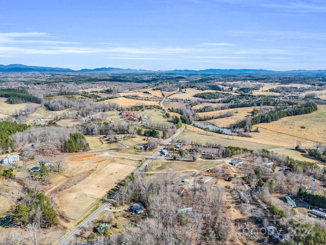 bird's eye view with a mountain view