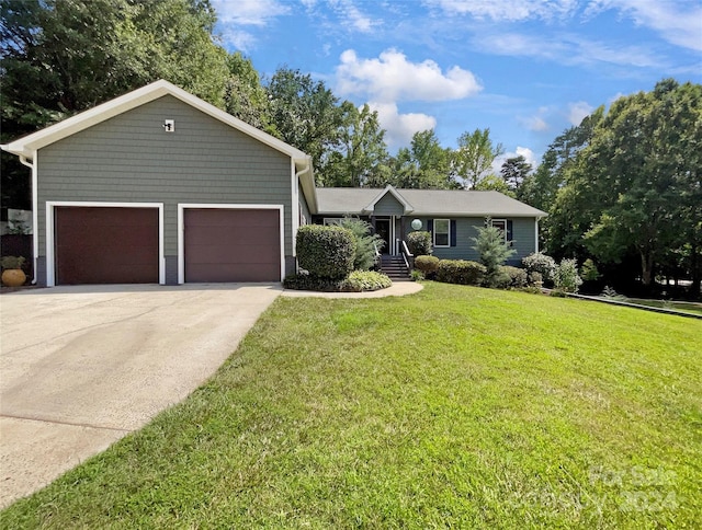 single story home with a front lawn and a garage