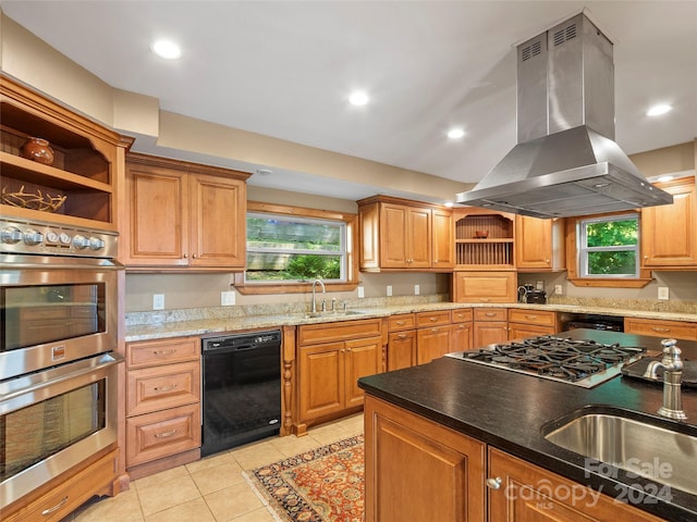 kitchen featuring light tile patterned floors, island range hood, stainless steel appliances, and sink