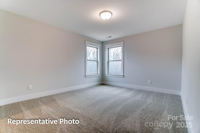 empty room with carpet floors