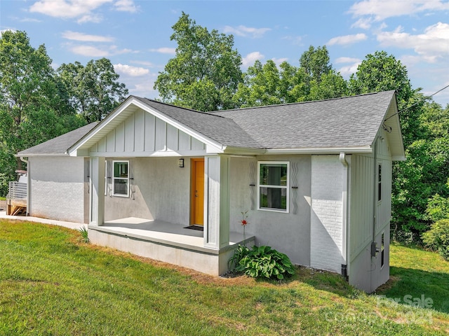 exterior space with a front lawn