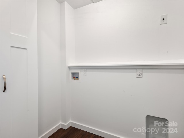 washroom with hookup for a washing machine, electric dryer hookup, and dark wood-type flooring