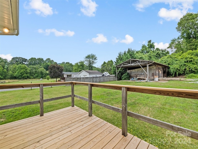 deck featuring a lawn