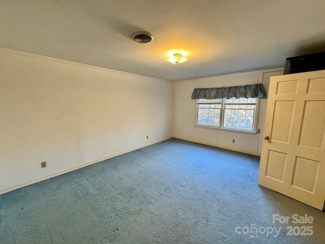 empty room featuring carpet floors