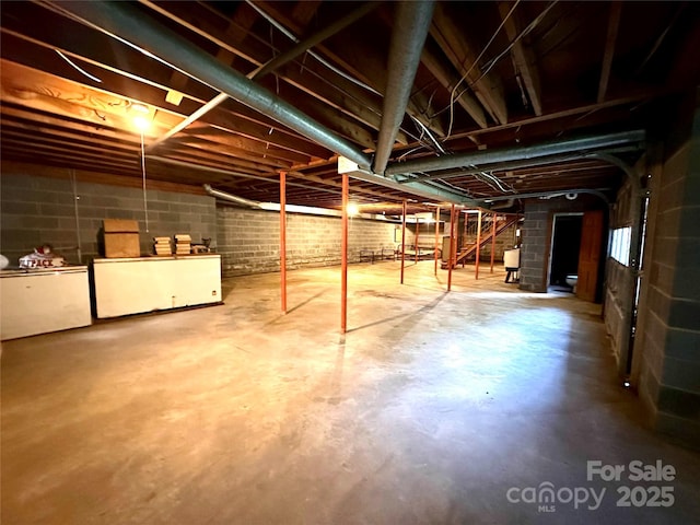 basement with fridge