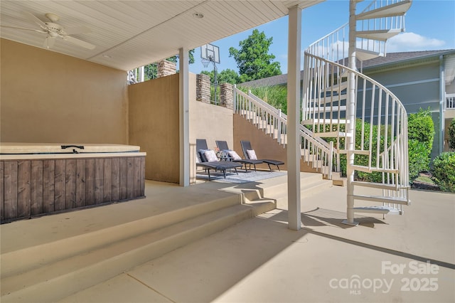 view of patio with ceiling fan