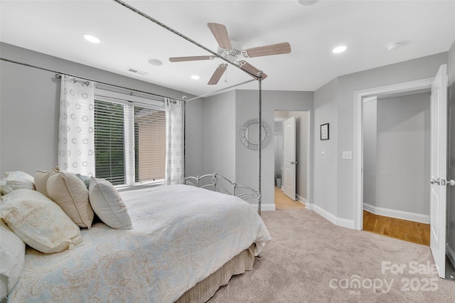 carpeted bedroom featuring ceiling fan