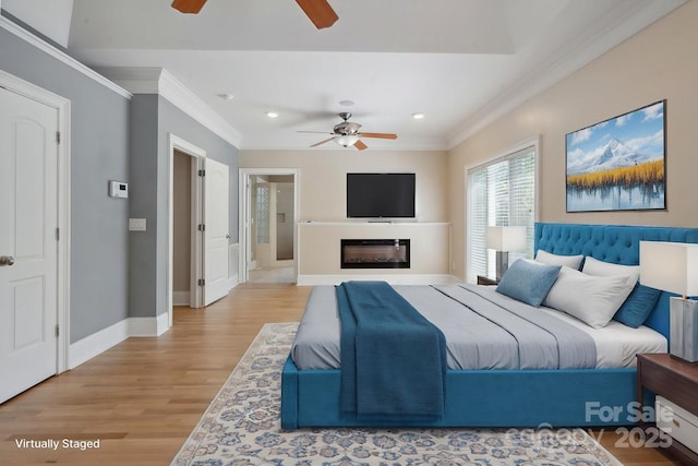 122 Long Cove Ln, Mooresville, NC 28117 - bedroom with connected bathroom, light wood-style floors, recessed lighting, baseboards, and ornamental molding