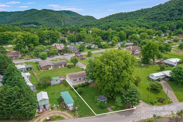 drone / aerial view featuring a mountain view