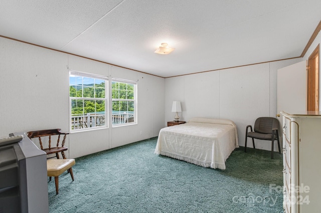 carpeted bedroom with ornamental molding