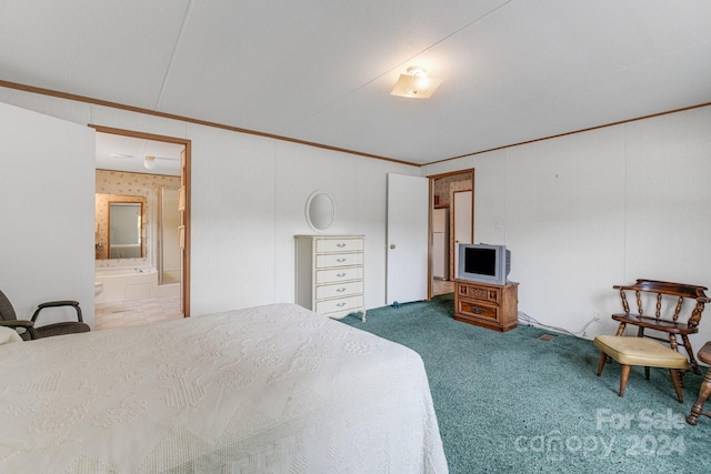 carpeted bedroom with white refrigerator, crown molding, and ensuite bath